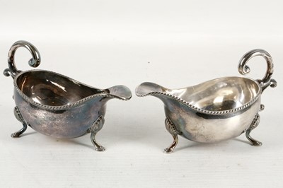 Lot 337 - A pair of vintage, sterling silver sauce boats...