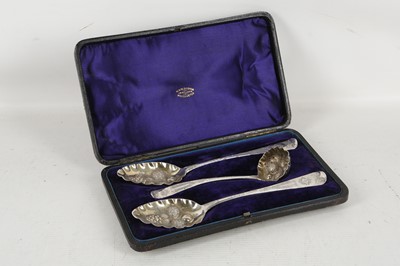 Lot 358 - A boxed set of Georgian sterling berry spoons...