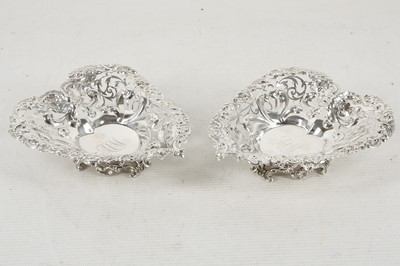 Lot 350 - A pair of sterling silver heart shaped dishes...