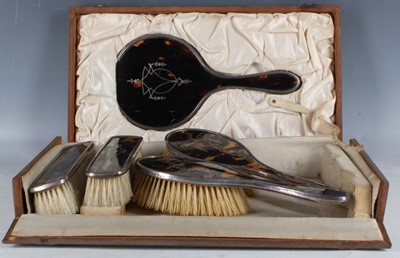 Lot 18 - An Art Deco silver and tortoiseshell dressing...