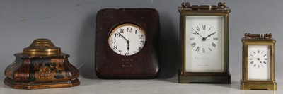 Lot 21 - A miniature brass carriage clock, another...