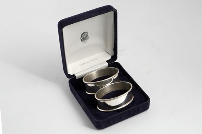 Lot 157 - Boxed pair of Vintage Sterling Silver napkin...