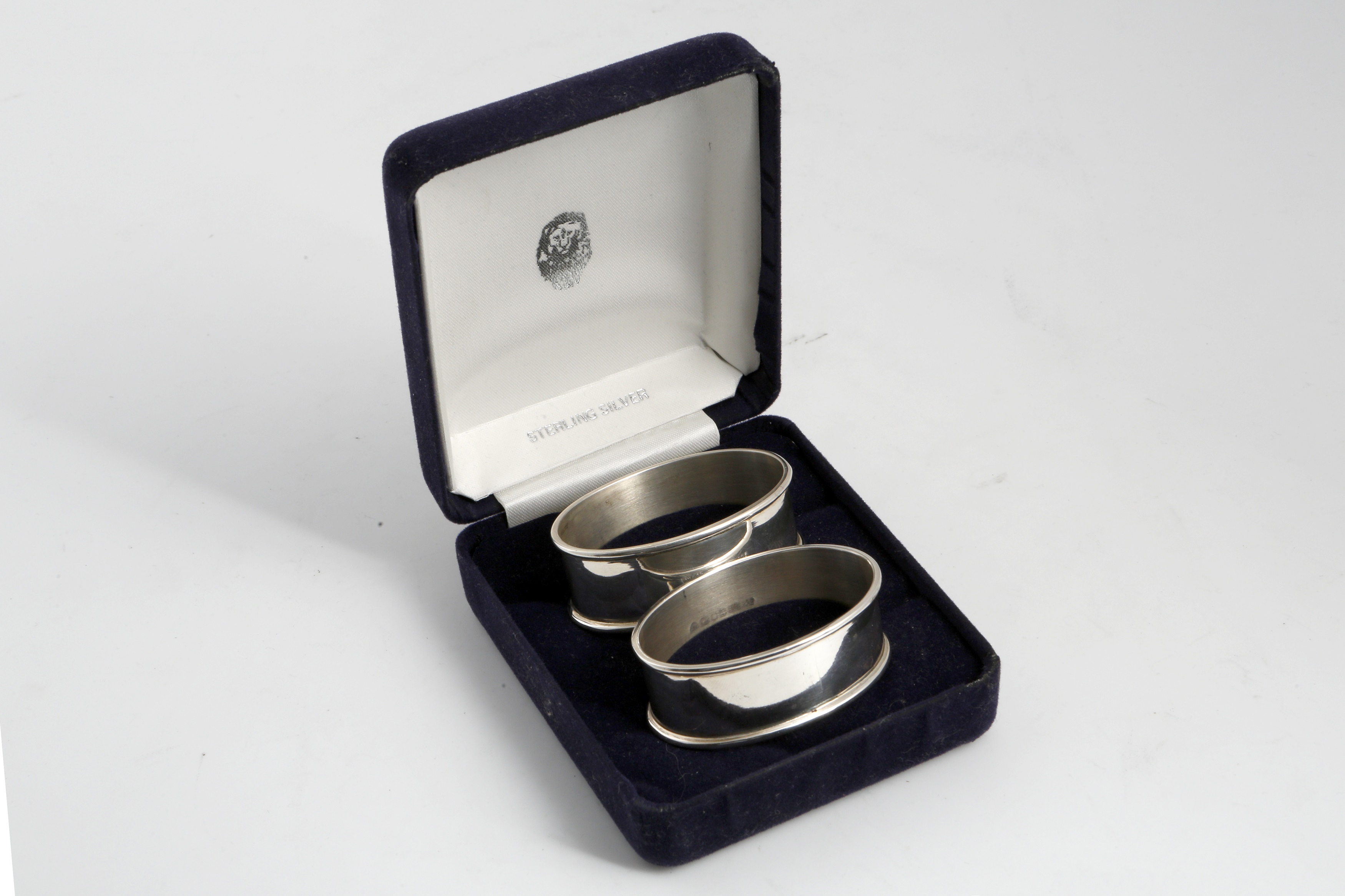 Lot 157 Boxed pair of Vintage Sterling Silver napkin