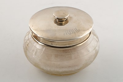 Lot 180 - Antique Sterling Silver lidded glass dressing...