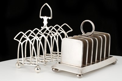 Lot 243 - An unusual antique silver plated warming toast...