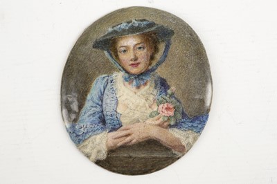 Lot 462 - An oval enamel plaque of a young woman in blue...