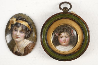 Lot 470 - A very small oval enamel portrait miniature of...