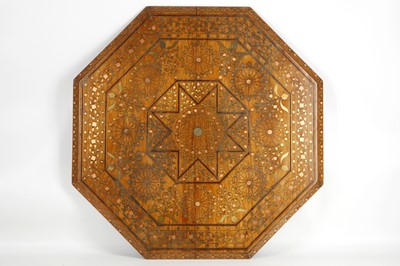 Lot 456 - An octagonal eastern table top, with brass and...