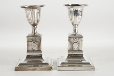 Lot 534 - A pair of hallmarked silver candlesticks,...