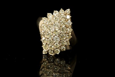 Lot 577 - An 18ct yellow gold and diamond set cluster...