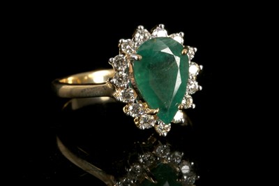 Lot 622 - An 18ct yellow gold, pear cut emerald and...