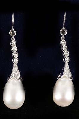 Lot 623 - A pair of 18ct white gold, diamond and pearl...