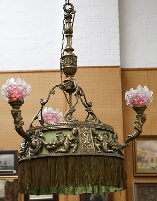 Lot 653 - A decorative brass hanging pendant light, set...