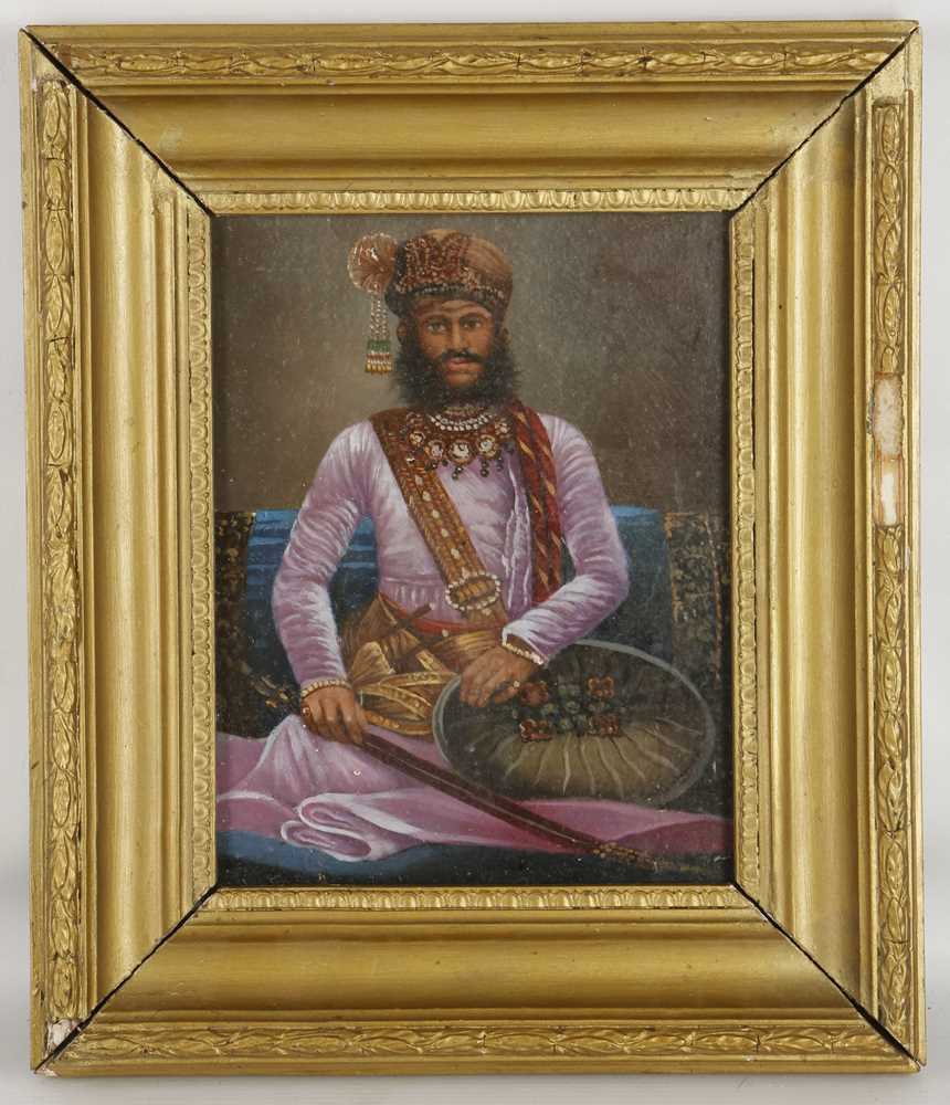 Lot 520 - An oil painting, portrait of a seated maharaja...