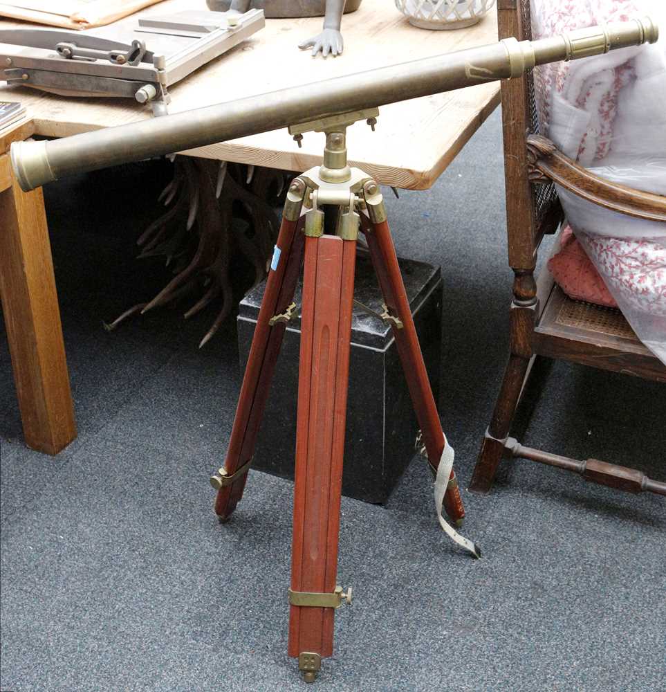 Lot 656 - A brass terrestrial telescope and adjustable...