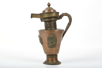 Lot 599 - A TIBETAN COPPER AND BRASS EWER AND COVER....