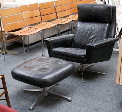 Lot 301 - A 1960s DANISH LOUNGE CHAIR AND FOOTSTOOL, in...