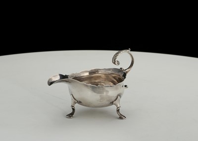 Lot 101 - Antique George II Sterling Silver sauce boat...