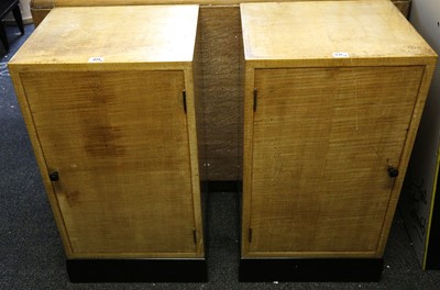 Lot 371 - A PAIR OF ART DECO BEDSIDE CABINETS, in birch...