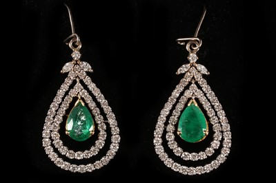 Lot 583 - A pair of 18ct white gold, emerald and diamond...