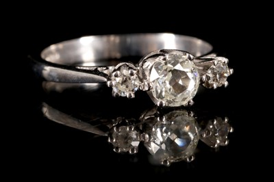 Lot 584 - An 18ct white gold and diamond three stone ring.