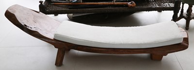 Lot 820 - A hardwood bench, worked from the upright foot...