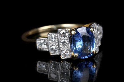 Lot 166 - An 18ct Gold, natural Sapphire and Diamond set...