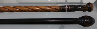 Lot 154 - A folk Art, Fruitwood cane, with spiral shaft -...
