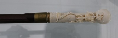 Lot 155 - A modern marine ivory cane, the grip carved...