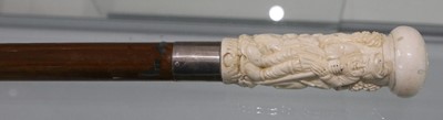 Lot 159 - A modern marine Ivory carved cane, the handle...