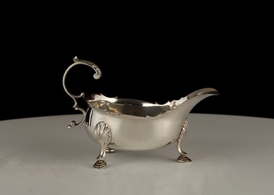 Lot 135 - Antique Sterling Silver sauce / gravy boat....