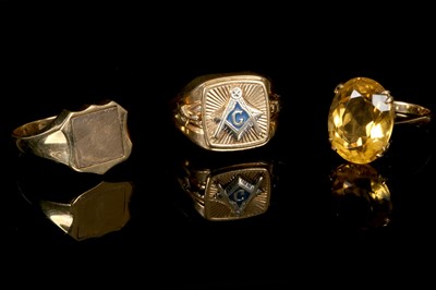 Lot 279 - A 9ct gold and citrine ring, together with two...