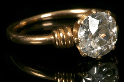 Lot 237 - A rose metal and diamond solitaire engagement...