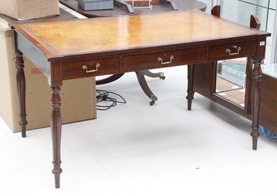 Lot 802 - A writing / library table of Regency style,...