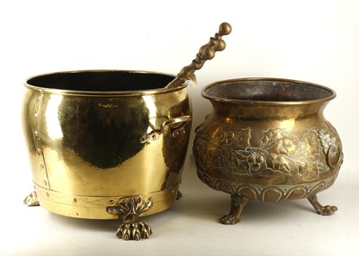 Lot 720 - A brass log pot, strap work and copper studs,...