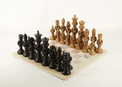 Lot 705 - A Cantonese carved wood chess set, each piece...