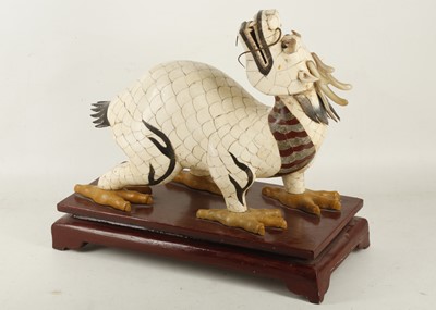 Lot 764 - A 20th Century Oriental model of a dragon in...