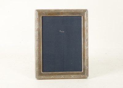 Lot 806 - A silver photograph frame retailed by Asprey,...