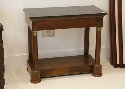 Lot 835 - A French Empire side table, black marble over...