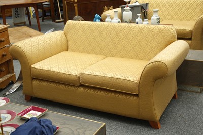 Lot 848 - A pair of wing arm sofas, gilt trailing acorn...