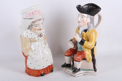 Lot 5 - A late 18th Century Staffordshire Toby jug in...