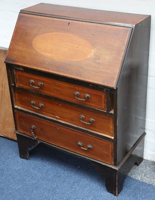 Lot 33 - An Edwardian mahogany inlaid bureau, the fall...