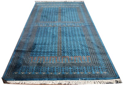 Lot 102 - A Pakistan Hatchlu design carpet, blue ground,...