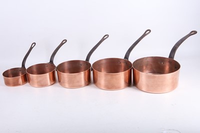 Lot 105 - A set of 5 graduated copper saucepans with...