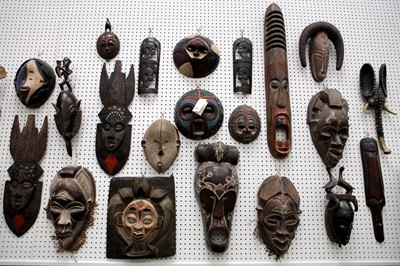 Lot 170 - A large group of African masks (Qty).