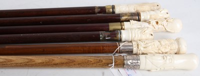 Lot 6 - Six walking sticks, each with carved ivorine...