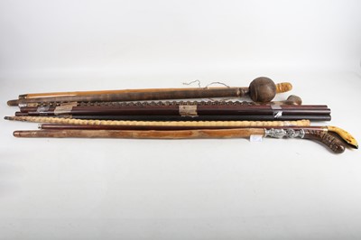 Lot 51 - A Japanese carved bamboo walking cane, five...