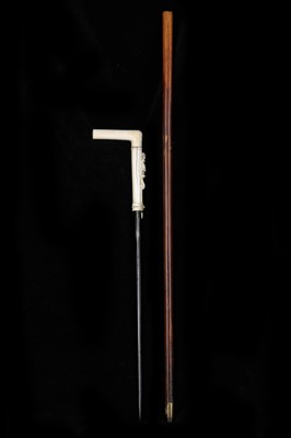 Lot 115 - A 19TH CENTURY IVORY HANDLED DAGGER STICK CANE,...