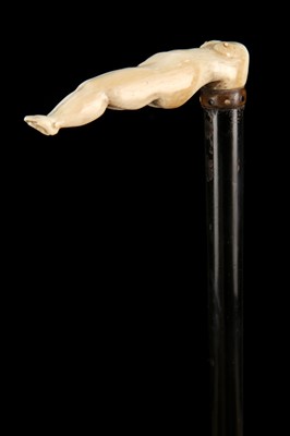 Lot 126 - AN ANTIQUE 'EROTICA' CANE, the ivory handle...