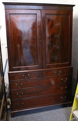 Lot 182 - A Georgian mahogany linen press, with twin...